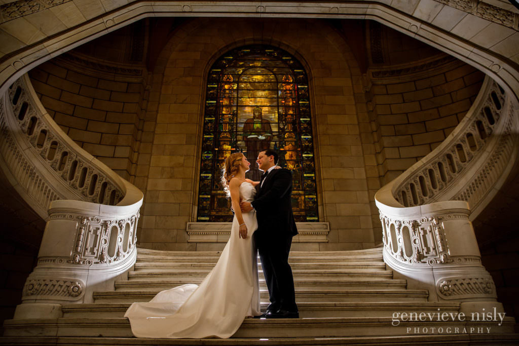 Wedding couple on the grand staircase at the old courthouse in Cleveland.