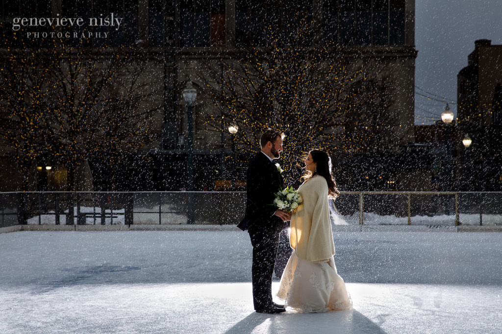Bride and groom on the ice rink in Downtown Canton, Ohio.