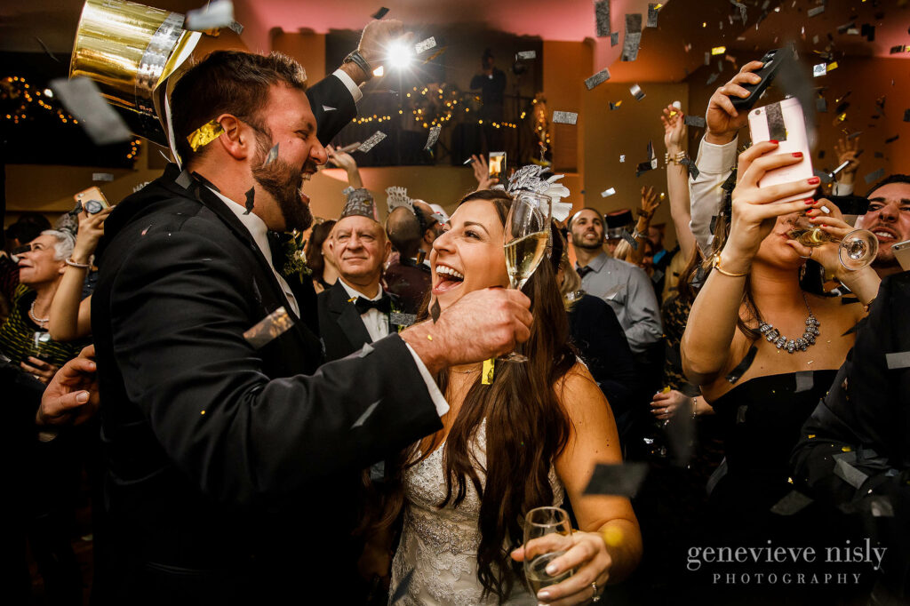 Bride and groom celebrate New Years Eve during the wedding at Onesto Lofts.