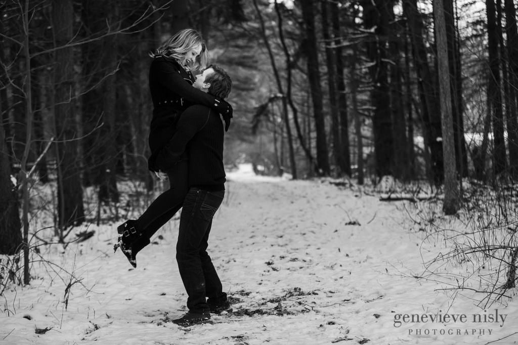 Michael spins Jacee during their Beottler Park engagement session in Green, Ohio.