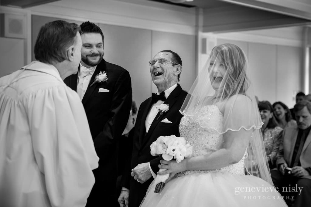 The groom, bride and her dad share a laugh during their wedding ceremony at Mooreland Mansion.
