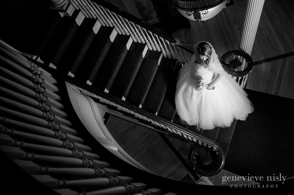 The stunning bride on the dramatic staircase at Mooreland Mansion.