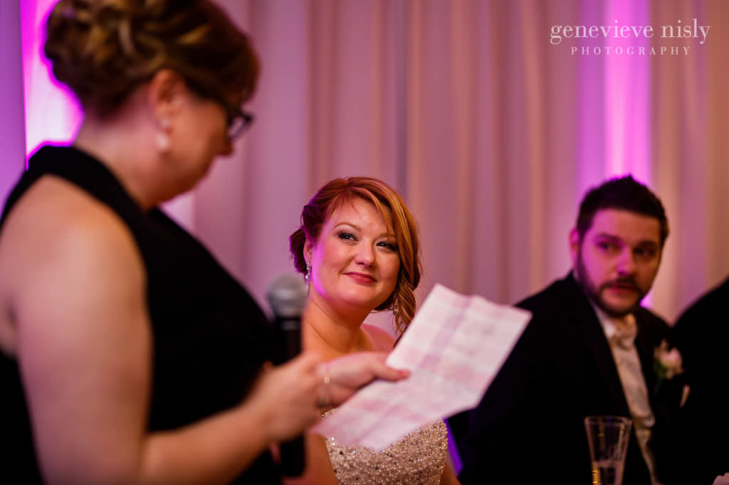 The bride lovingly smiles at her sister during her toast at the Cleveland Holiday Inn.