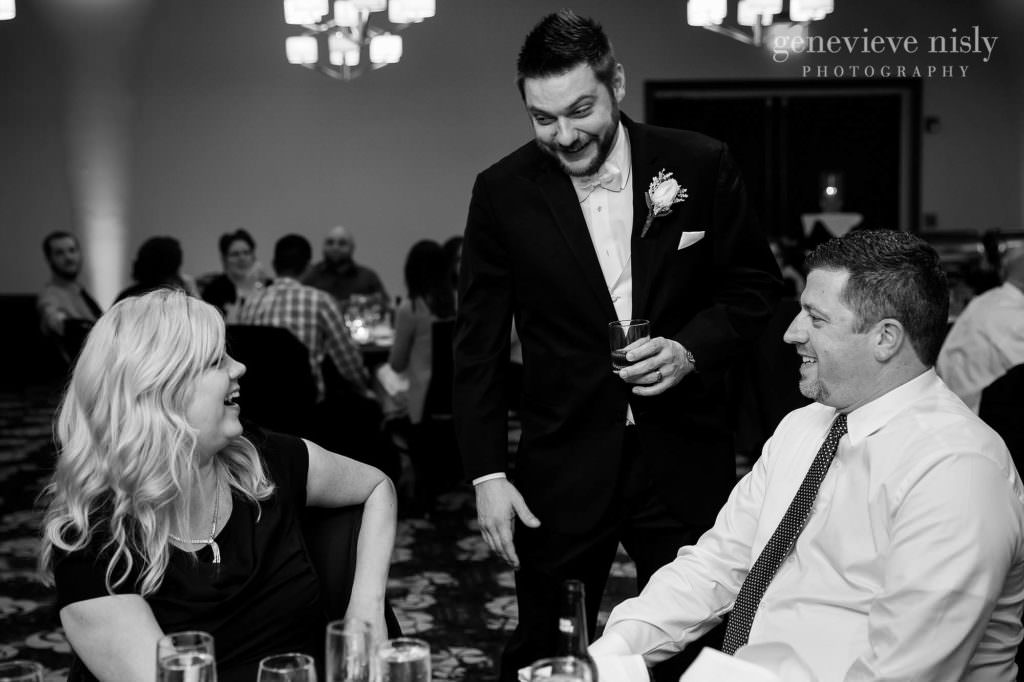The groom mingles with guests during his wedding reception at the Cleveland Holiday Inn.