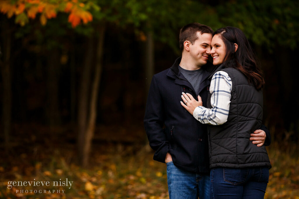 Gabby and Jordan in their back yard during a fall engagement session in Cleveland, Ohio.