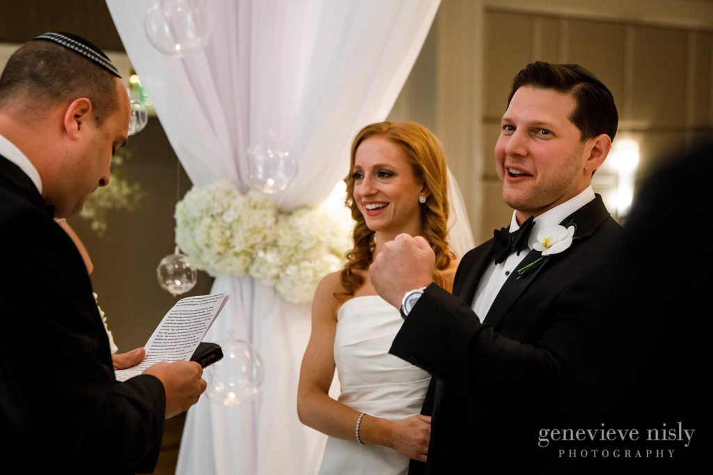 Max does a fist pump during the ceremony at the Ritz Carlton.