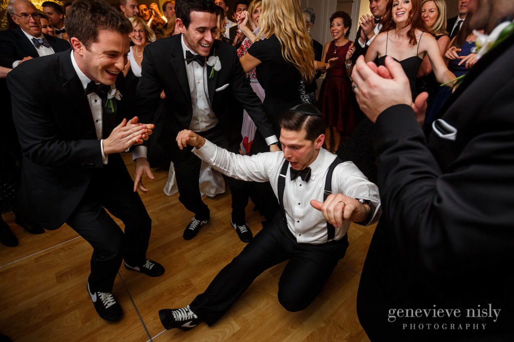 Max dances surrounded by groomsmen during the reception at the Ritz Carlton.