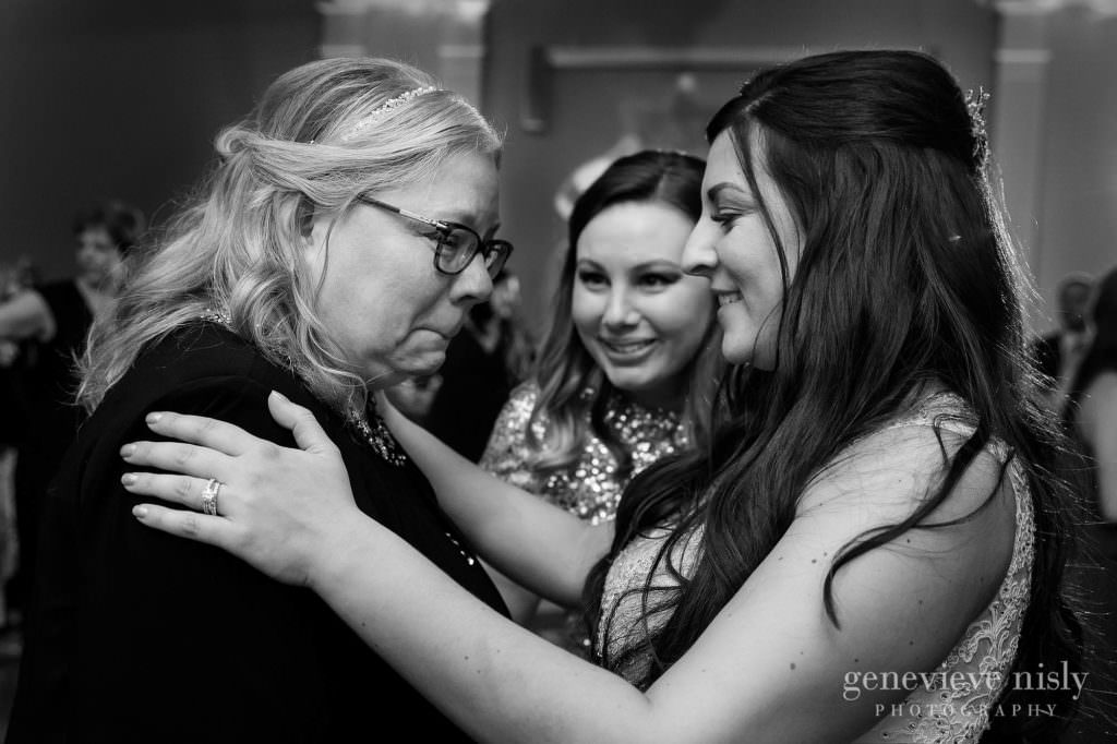 A mother's emotional reaction to dancing with her daughter on her wedding day.