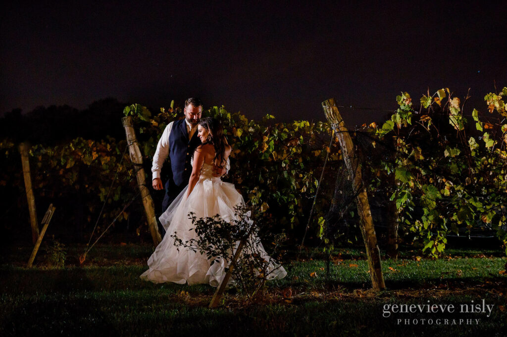Ryan and Jennifer in the vineyards at night during their wedding at Gervasi Vineyards in Canton, Ohio.