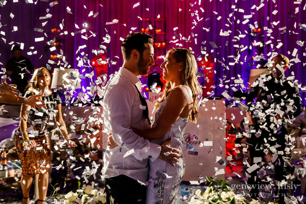 Kara and Jeremy celebrate with confetti during their New Year's Eve wedding reception at the Hilton Downtown in Cleveland, Ohio.