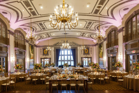 A elegant wedding reception in the Crystal Ballroom at Tudor Arms Hotel in Cleveland, Ohio