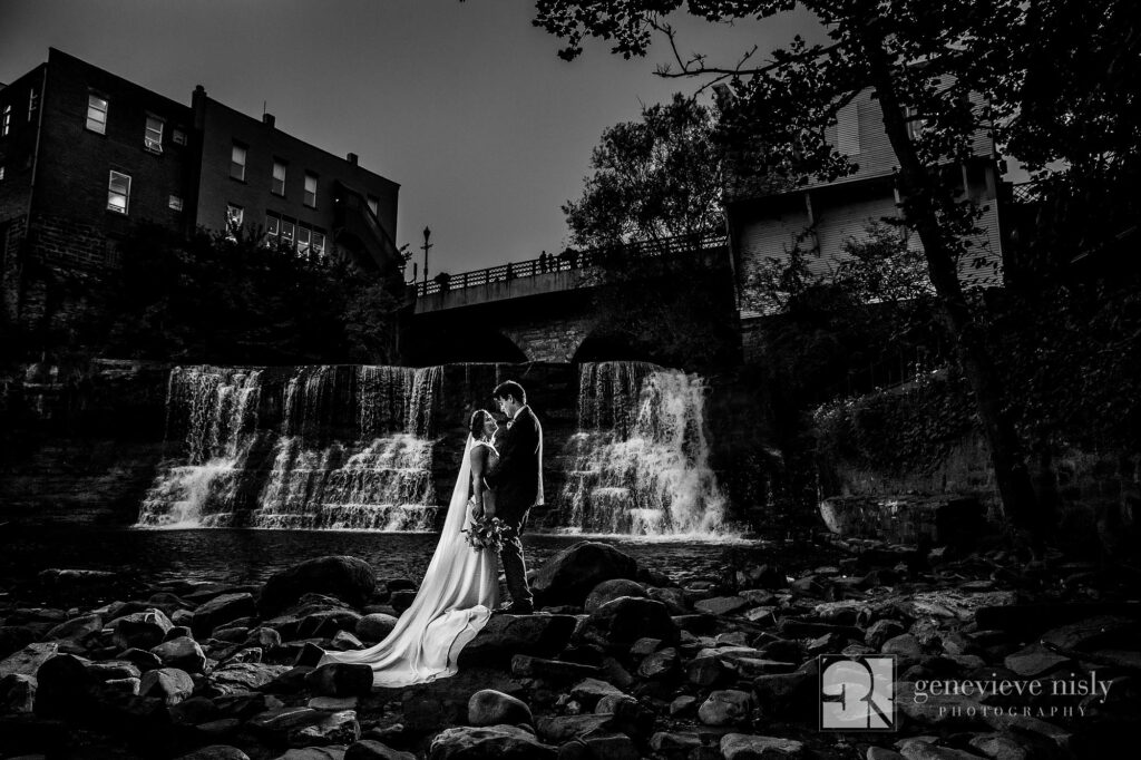 Chagrin Falls wedding portrait of a bide and groom down by the falls.